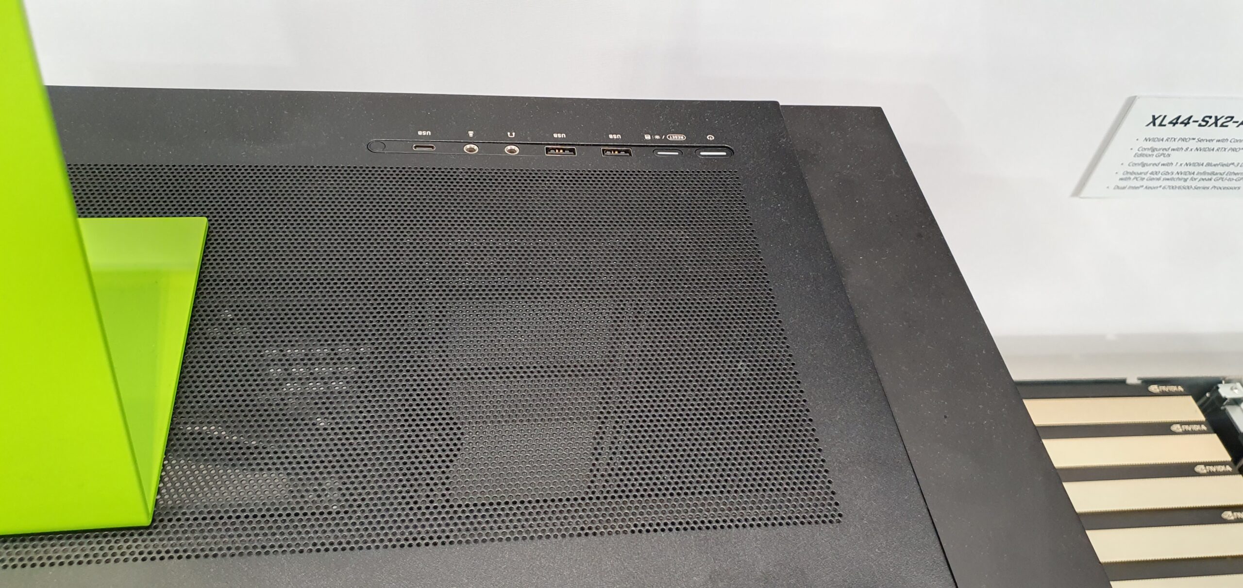Close-up of workstation chassis top panel showing front I/O ports and mesh ventilation — Gigabyte W775-V10-L01 NVIDIA DGX Station GB300