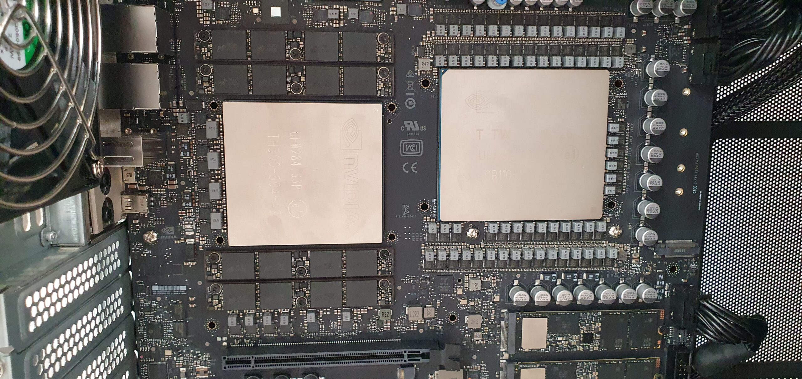Close-up of a workstation motherboard showing an NVIDIA-labeled chip package next to a large CPU package surrounded by memory modules… — Gigabyte W775-V10-L01 NVIDIA DGX Station GB300