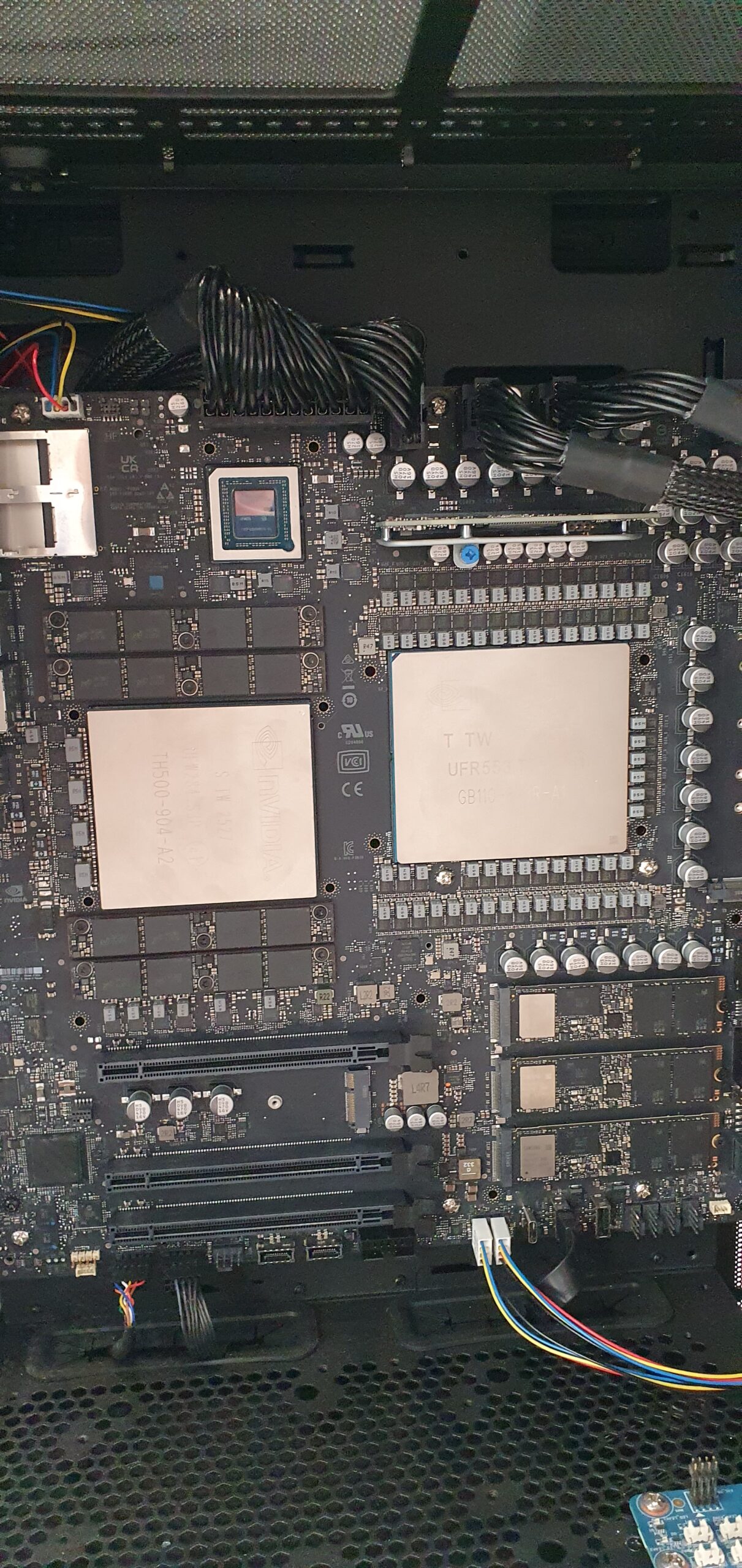 Workstation motherboard interior showing dual CPU heat spreaders, RAM slots, and expansion connectors — Gigabyte W775-V10-L01 NVIDIA DGX Station GB300