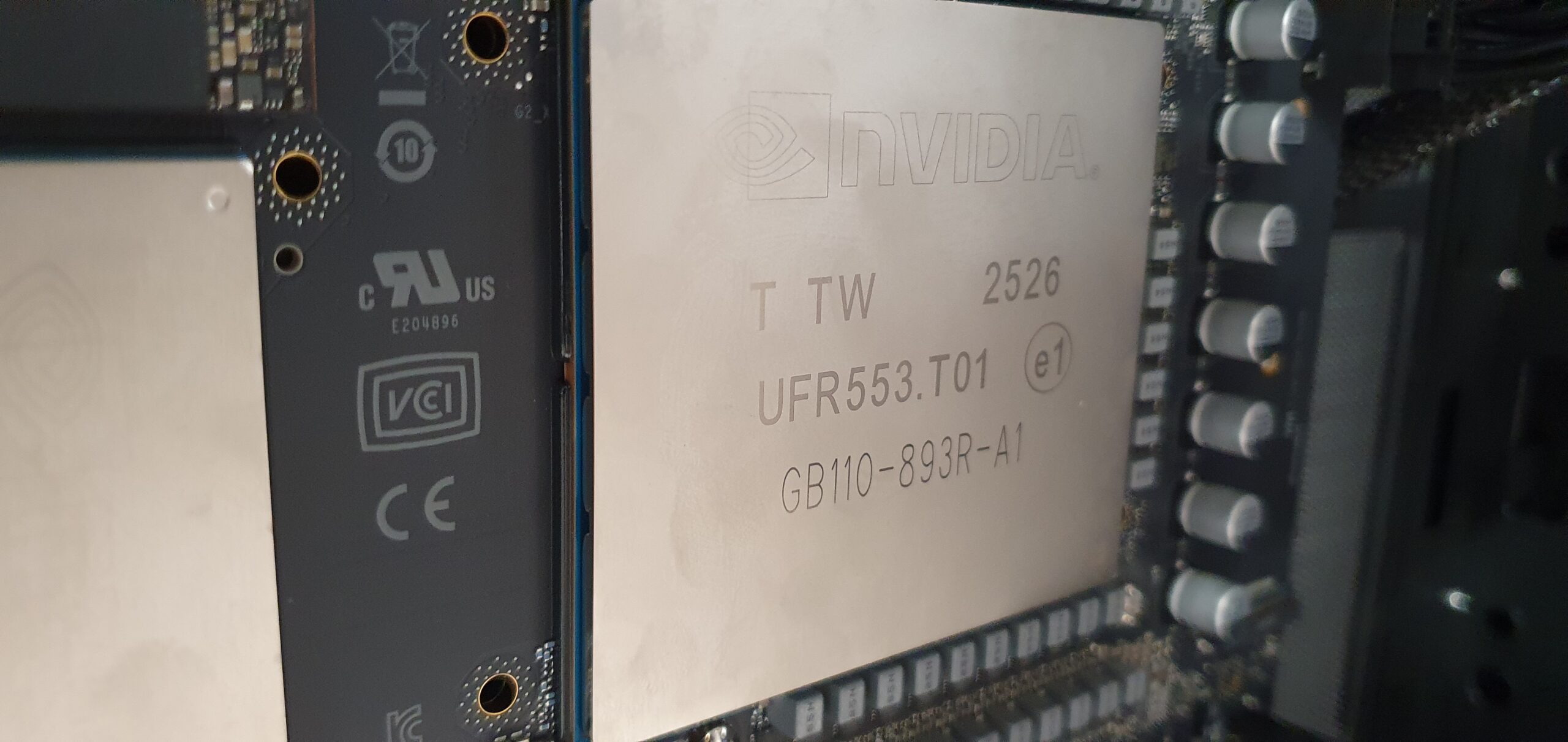 Close-up of an NVIDIA GPU module heat spreader mounted on a circuit board — Gigabyte W775-V10-L01 NVIDIA DGX Station GB300