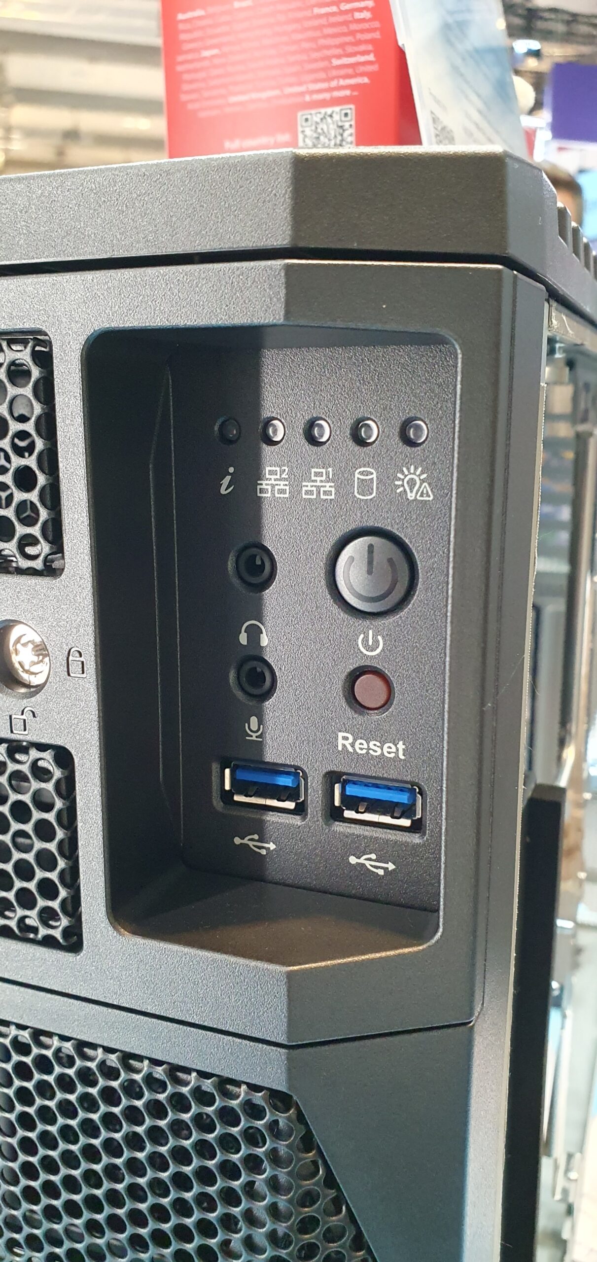 Close-up of the workstation's front panel with power button, reset button, USB 3.0 ports, and audio jacks — Supermicro ARS-511GD-NB-LCC NVIDIA DGX Station GB300