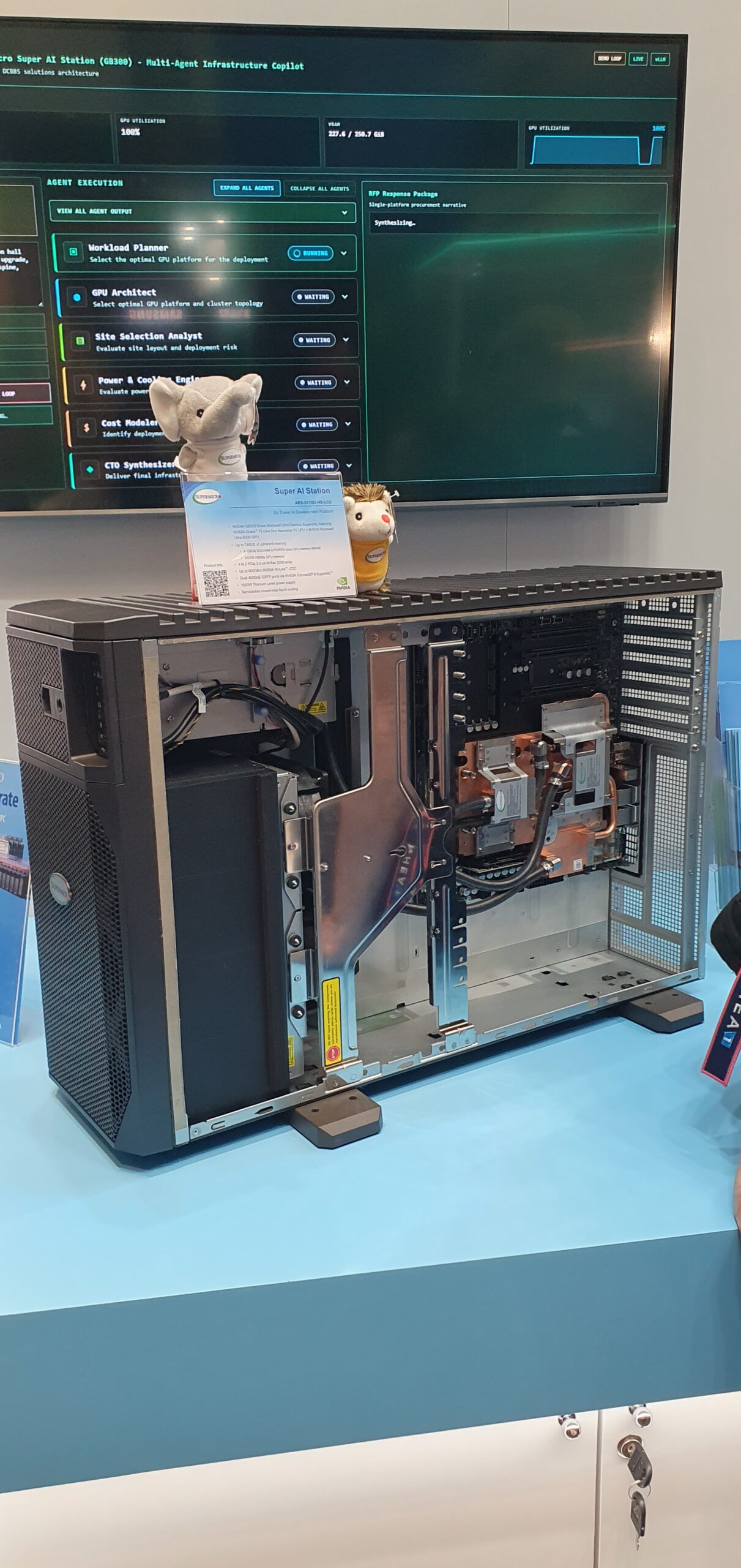 Open tower workstation chassis on display with internal cooling and GPU components visible — Supermicro ARS-511GD-NB-LCC NVIDIA DGX Station GB300