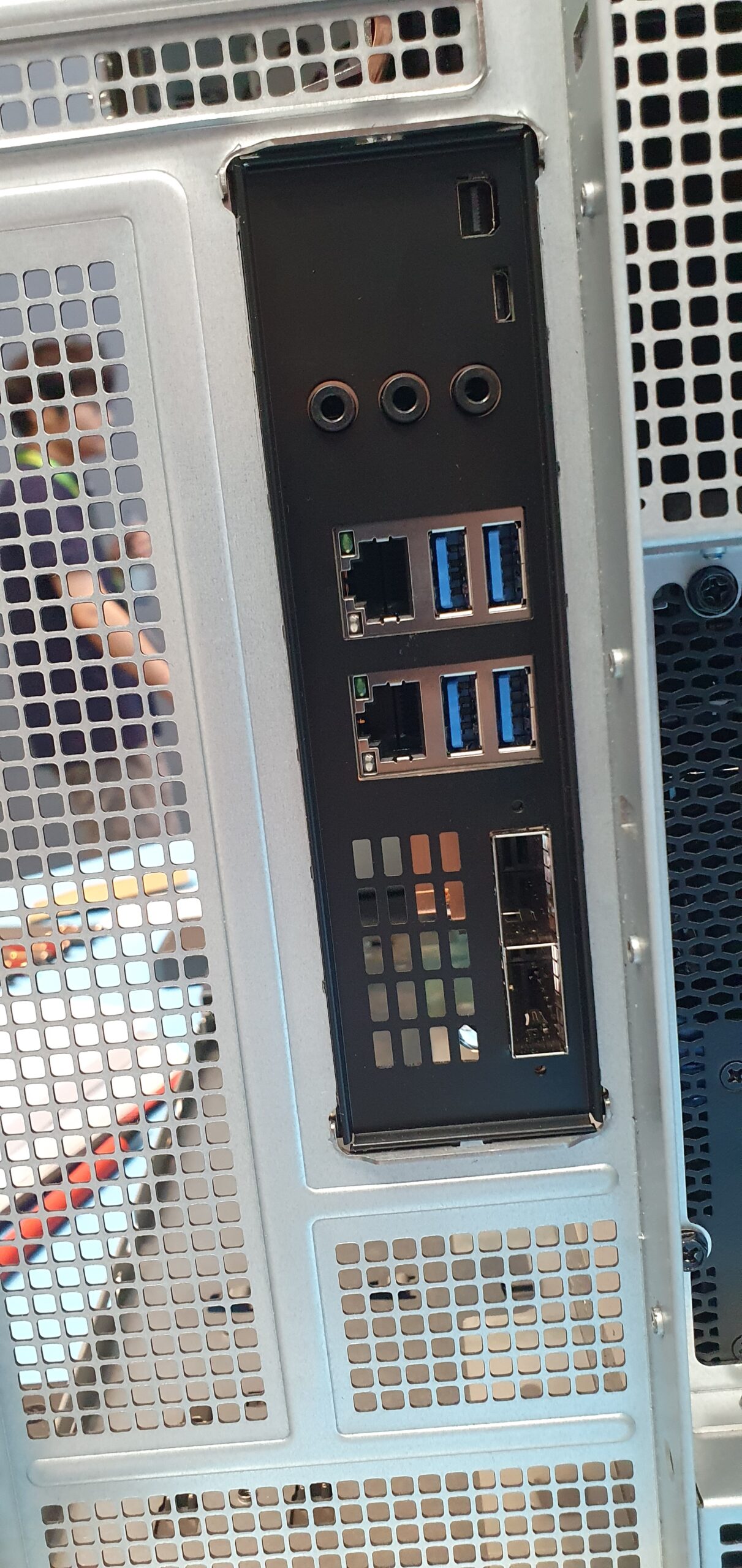 Rear I/O panel of the workstation showing dual LAN, USB 3.0, audio jacks, and display connectors — Supermicro ARS-511GD-NB-LCC NVIDIA DGX Station GB300